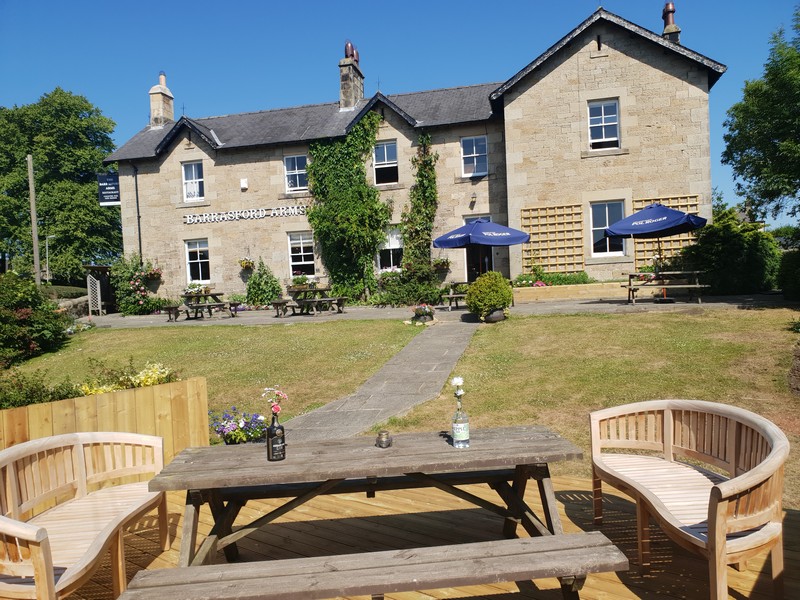 alt="Barrasford Arms front elevation and garden dine out"