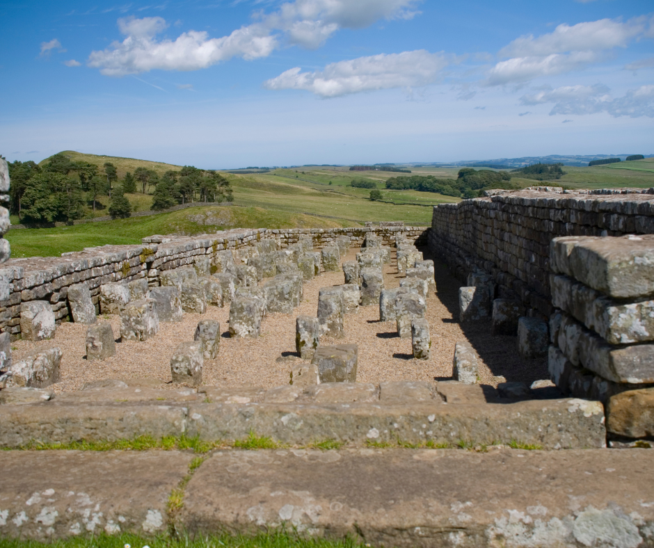 alt="Housesteads remains and panoramic views"