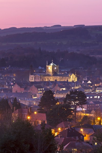 alt=view of Hexham with abbey sitting centrally"