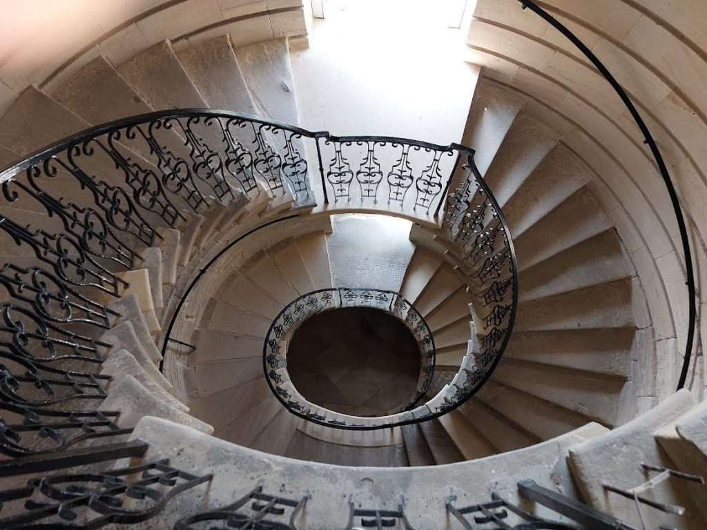 alt="spiral stone staircase"